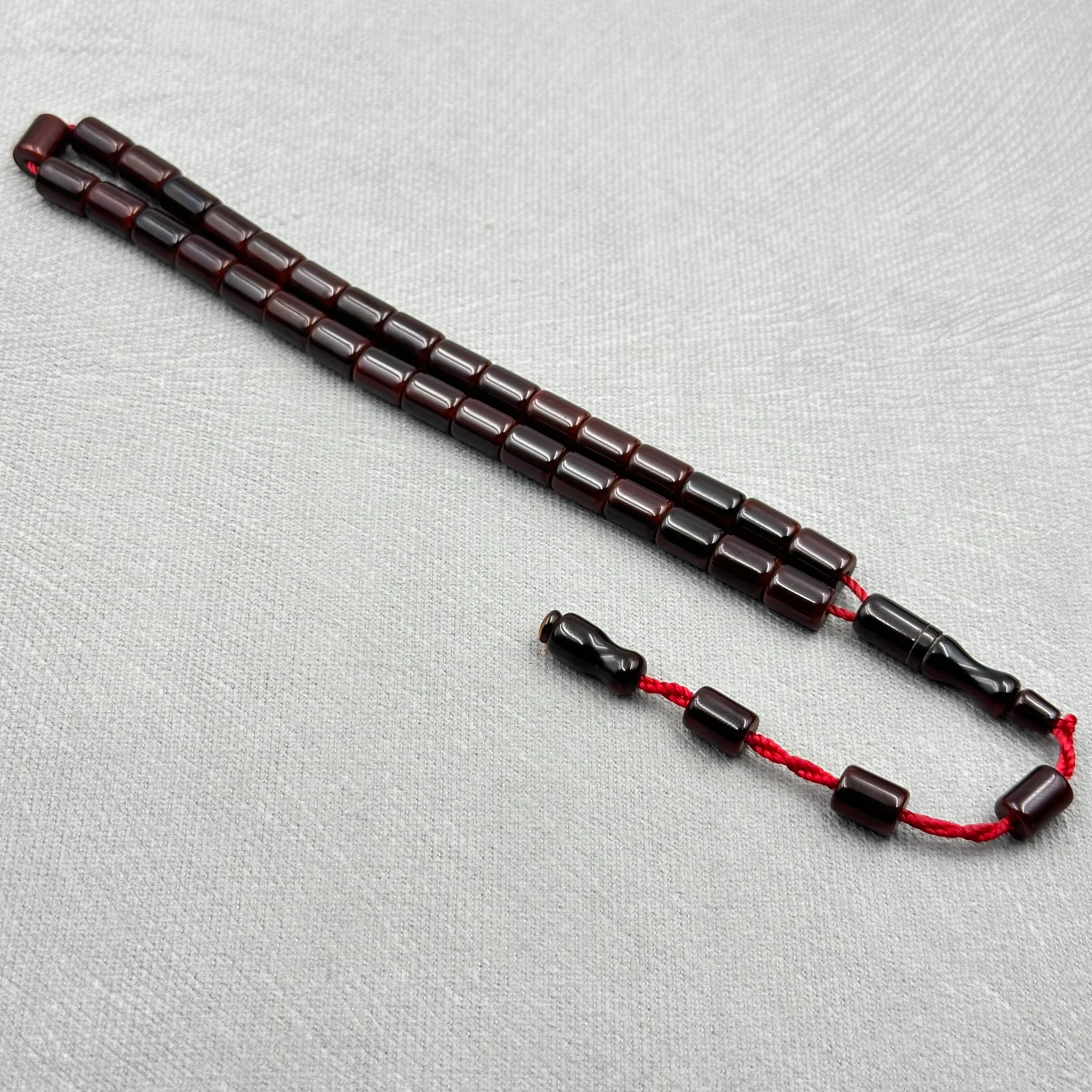 Koyu Kahve Parlak Köşeli Kesim Sıkma Kehribar Tespih